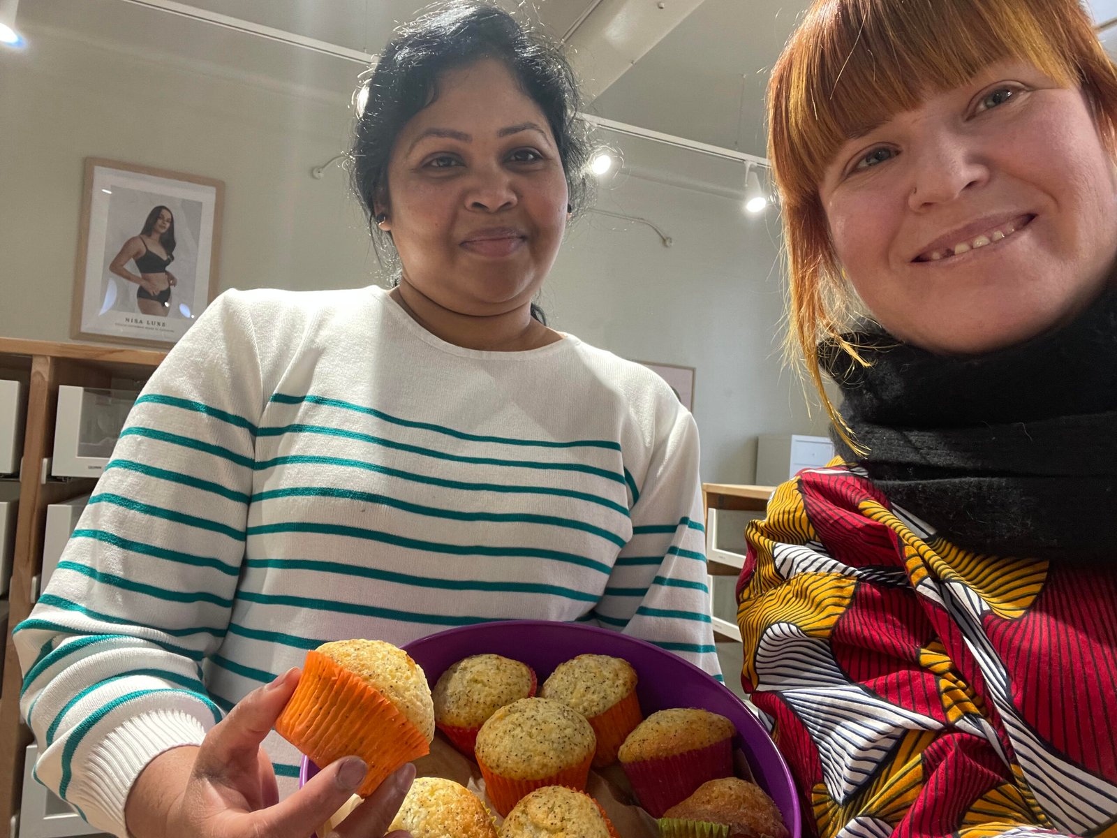 Queen, Pam, and a plate of lemon poppyseed muffins.